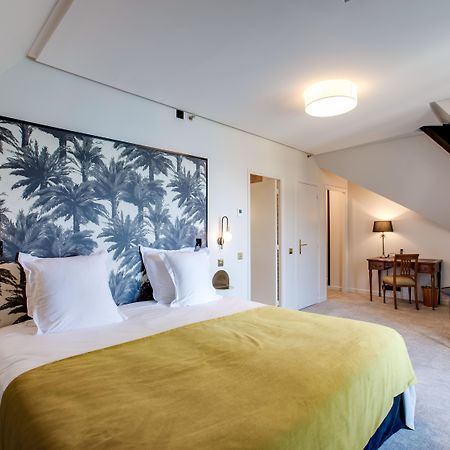 Le Palace De Menthon Εξωτερικό φωτογραφία A room at the hotel